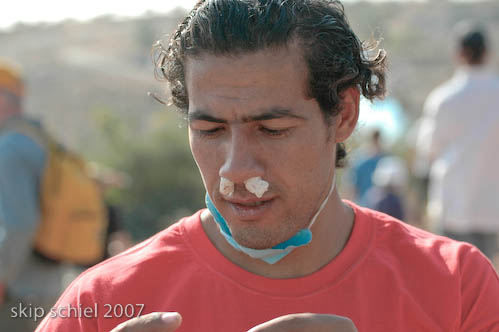 Alcohol soaked cotton to lessen tear gas effects