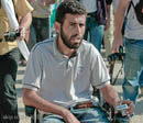 Ronny, shot in the back by soldiers and partially paralysed